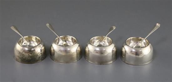 A set of four early George I Britannia standard silver circular salts by James Goodwin, salt diameter 7cm.